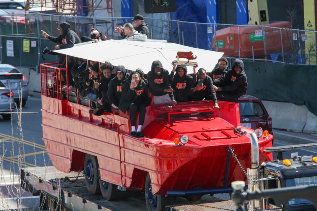 Students riding a duckboat in the North High Rolling Rally on March 26, 2023.
